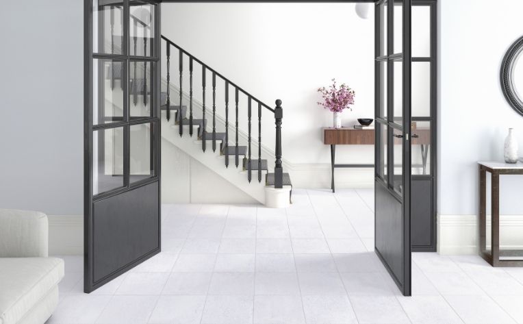 ceramic tiles flooring in entryway with modern decor.